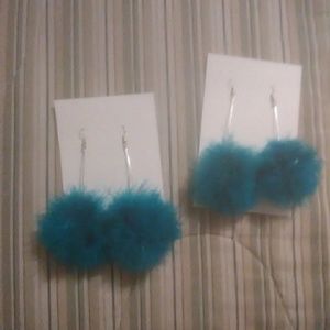 My handcrafted feather ball earrings